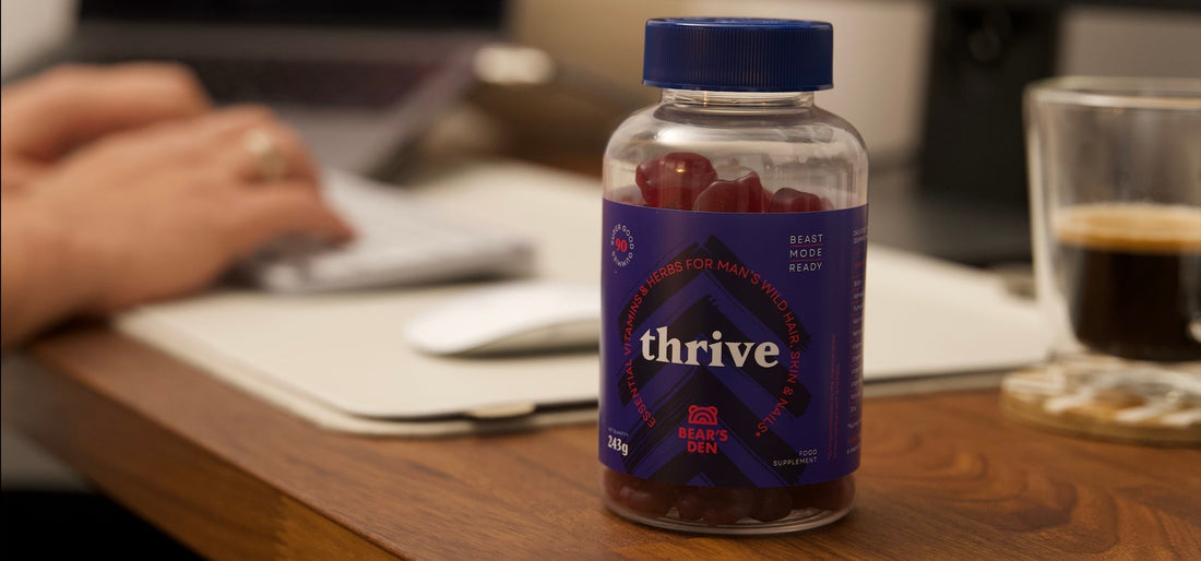 Close up of Thrive men’s hair growth supplement bottle